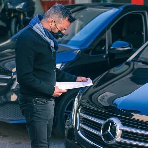 Andy driver checking a Van