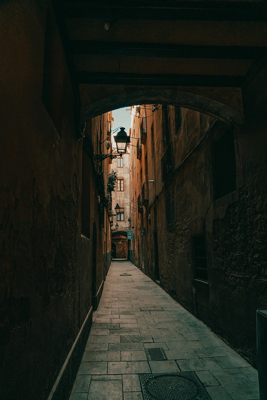 a narrow passageway in Barcelona